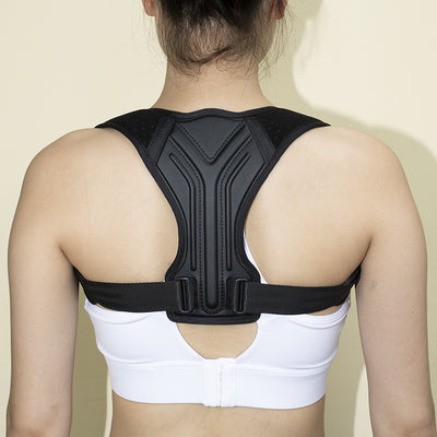 Back posture corrector belt with sponge padding for comfort and support
