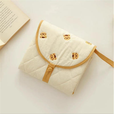 Compact baby diaper mat with soft padding for comfort