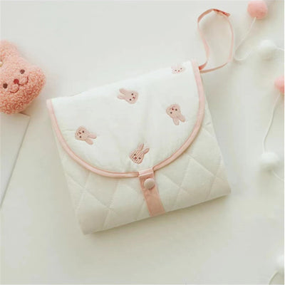 Compact baby diaper mat with soft padding for comfort