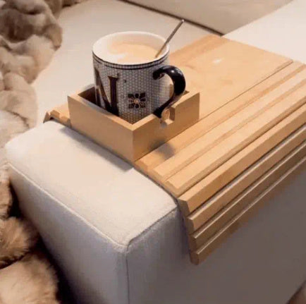 Modern minimalist bamboo sofa tray on a couch armrest