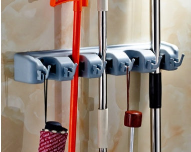 Plastic wall-mounted mop hook and broom holder for organizing cleaning tools